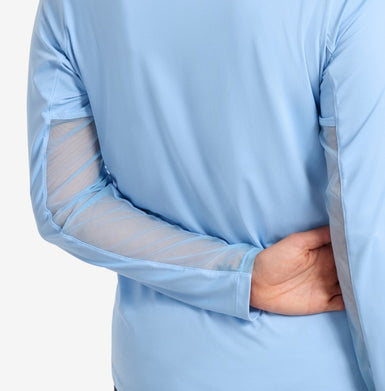 Light blue long-sleeve shirt with sheer mesh sleeves on a plain background