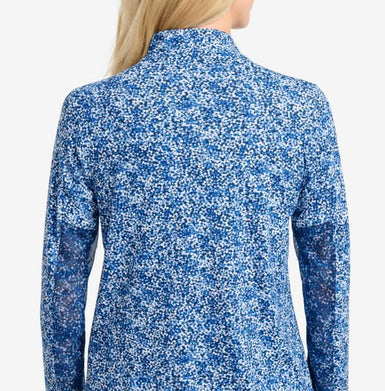 Blue and white patterned long-sleeve top on a plain background